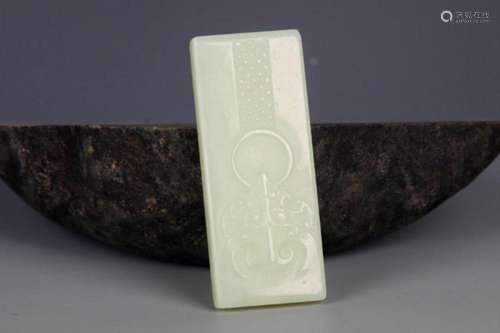 A FINELY CARVED HETIAN PALE CELADON JADE PENDANT PENDANT