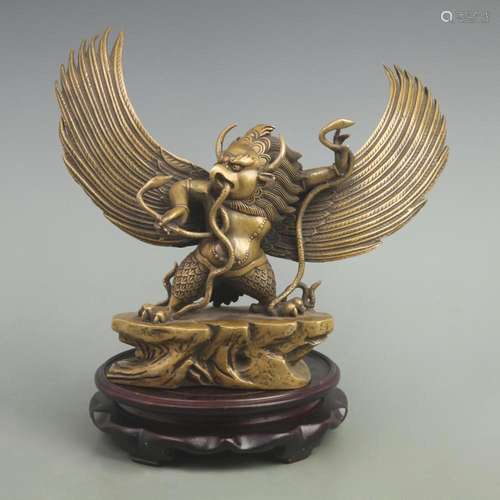 A RARE TIBETAN BRONZE STATUE OF GARUDA WITH GOLDEN WINGS