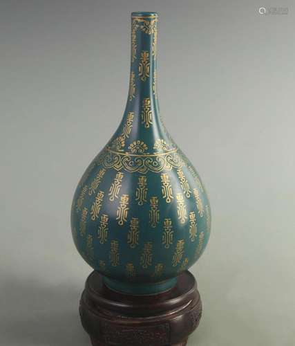 A DARK BLUE AND GILT FINELY PAINTED PORCELAIN BOTTLE