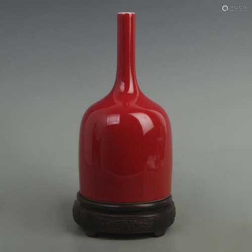 LANG RED GLAZED ROCKING BELL-SHAPED PORCELAIN VESSEL