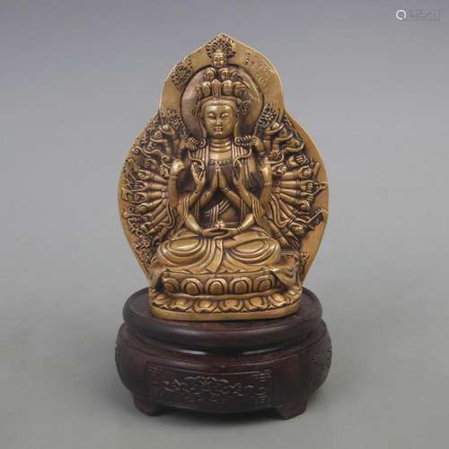 A FINE BRONZE THOUSAND ARMED GUAN YIN FIGURE