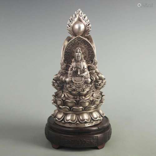 A SILVER GILT BRONZE THREE FACE GAUTAMA BUDDHA STATUE