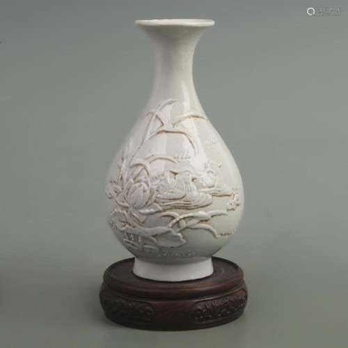 A LOTOS FLOWER CARVING PORCELAIN YU HU CHUN STYLE BOTTLE