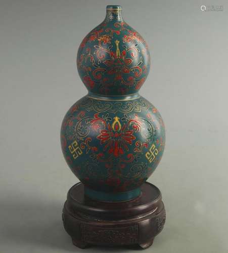 BLUE GROUND WITH GILT DECORATED GOURD PORCELAIN VASE