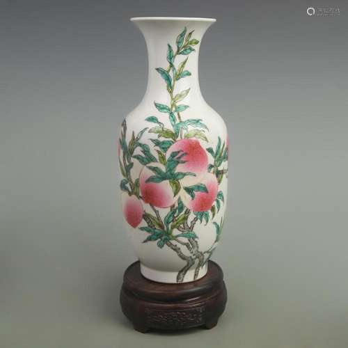 A FINE FAMILLE ROSE NINE PEACHES WINTER MELON PORCELAIN VASE