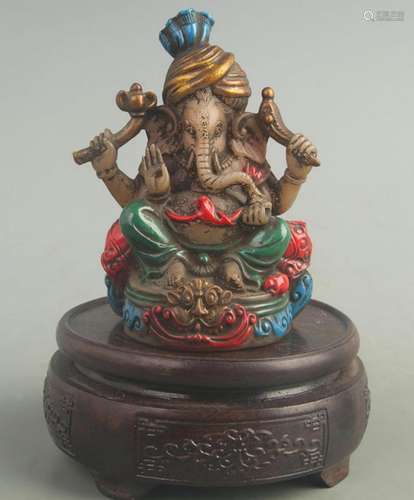 A FINE COLORED GLASS FINELY MADE GANESHA STATUE