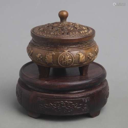 A FINELY CARVED BRONZE THREE FOOT INCENSE BURNER