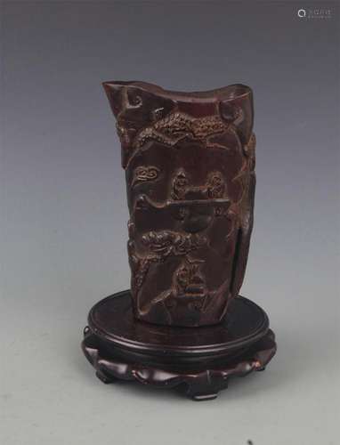 A FINELY CARVED CUP