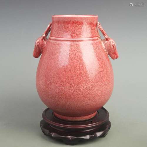 A FINE CINNABAR RED GLAZED DOUBLE DEER HANDLED PORCELAIN VAS...