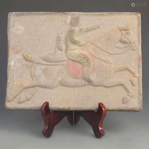 TANG DYNASTY STYLE CLAY BRICK CARVED WITH A KNEELING FIGURE