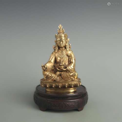 A FINE BRONZE GILT STATUE OF THE GOD OF WEALTH