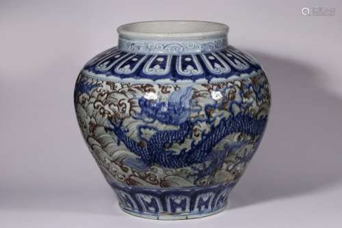 Blue and white glazed red seawater dragon pattern large jar