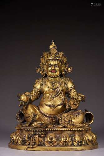 Gilt bronze seated yellow God of Wealth