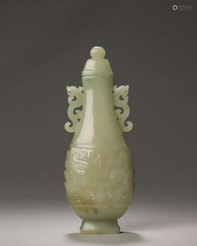 A taotie patterned double-eared jade vase,Qing Dynasty,China