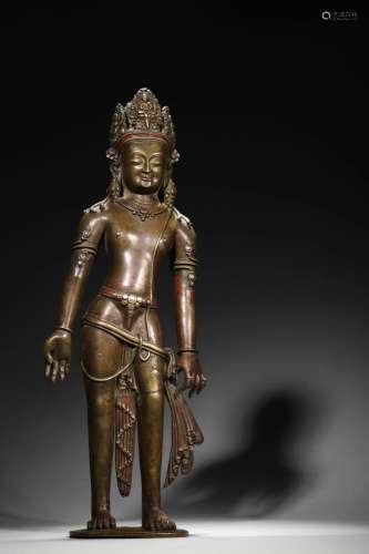 A silver-inlaid copper Guanyin bodhisattva statue