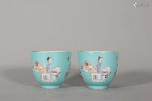 A pair of turquoise glaze famille rose figure porcelain cups...