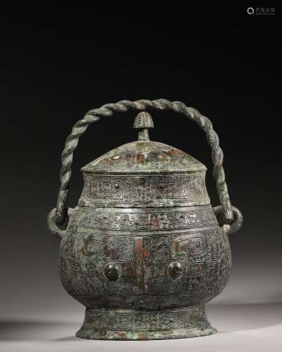 A taotie patterned loop-handled bronze pot,Han Dynasty,China