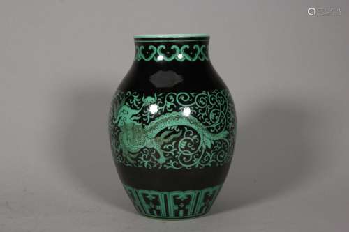 A black ground green kui dragon porcelain olive shaped zun,Q...
