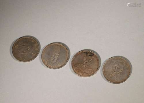 A group of silver coins