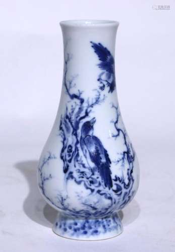 blue and white flower and bird vase