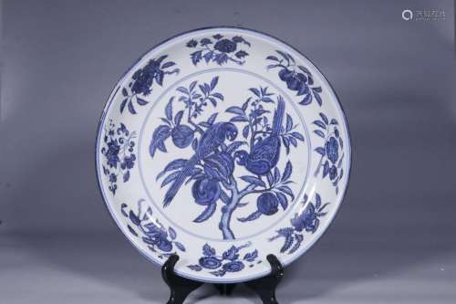 Large platter with blue and white flower and bird patterns