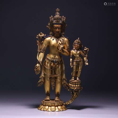 A Gilt Bronze Figure of Avalokitesvara with Lotus Hands