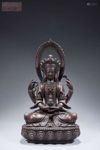 Agarwood carved four-armed Avalokitesvara seated statue
