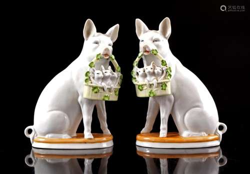 Porcelain pair of window pigs