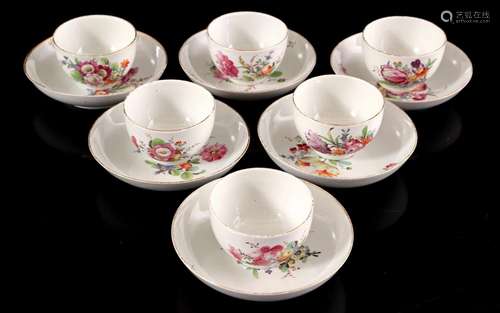 7 cups and 6 porcelain saucers