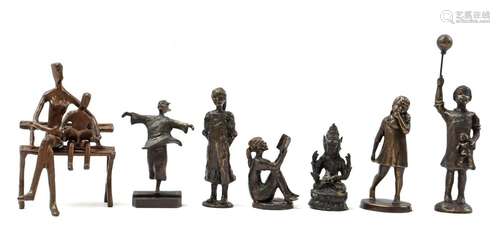 7 bronze figurines of children