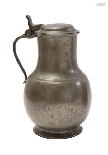 A pewter lidded jug