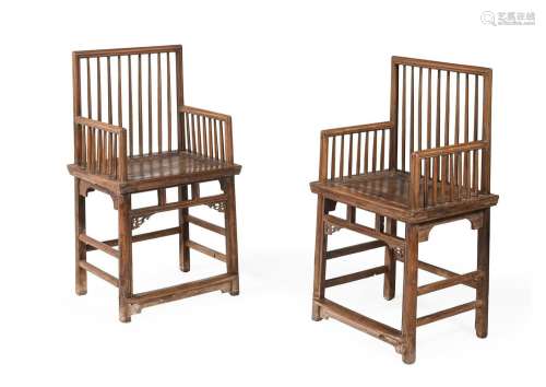 A pair of Chinese hardwood armchairs