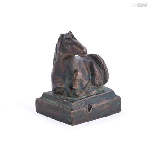 A Chinese bronze seal in the form of a horse