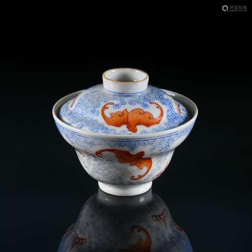 A Chinese iron red and blue enamelled bowl and cover