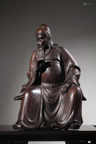 Seated statue of Guan Gong carved in agarwood