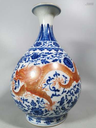 Blue and white Vatican red trace gold double dragon jade pot...