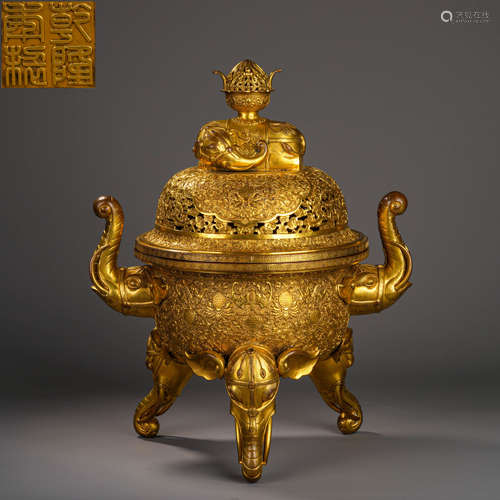 A Gilt Bronze Elephant Button Fushou Furnace Made in the Qia...