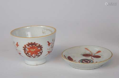 A Chinese iron red tea cup & a saucer, cup Qing dynasty, sau...