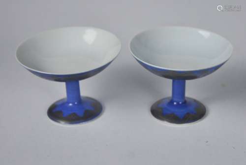 A pair of miniature blue glazed stem bowls, 20th C.