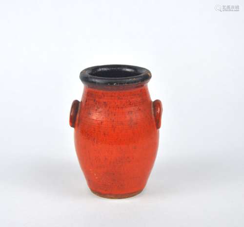 A Japanese red glazed jar