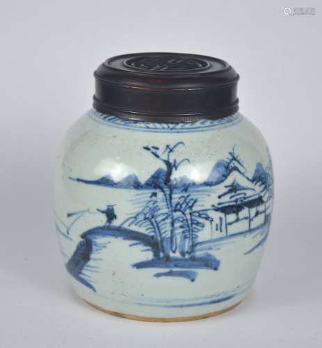 A Chinese blue & white jar with a fitted wooden cover, Qing ...