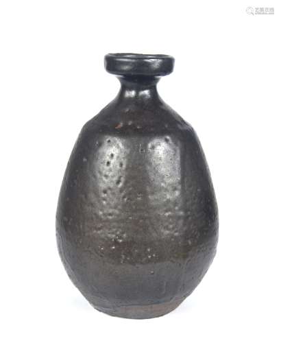 An early Chinese brown glazed vase
