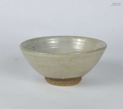 A Chinese grey celadon tea bowl, Ming dynasty