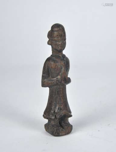 A small early wooden monk