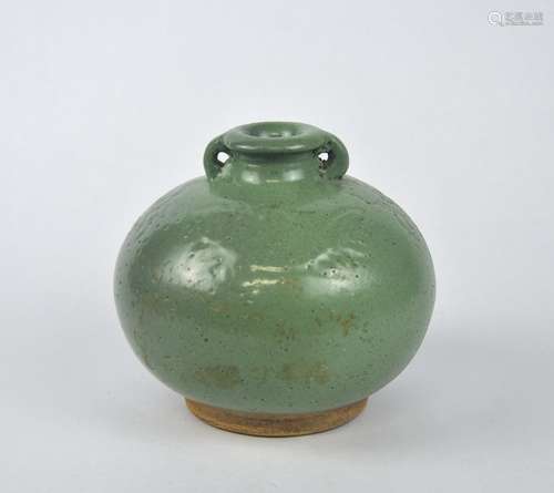 A Chinese green glazed jar decorated with fishes, Ming/Qing ...