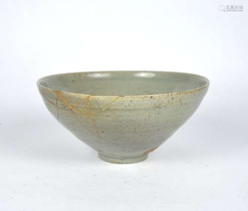 An early Chinese celadon galzed bowl with kintsugi, Song dyn...