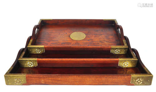 A set of three Chinese rosewood trays, Republic period