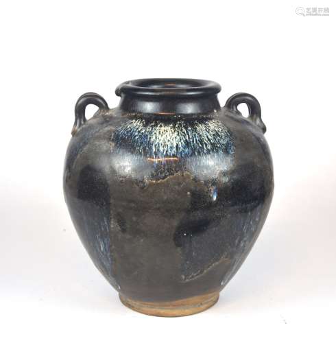 A Chinese double handled jar with splashes of flambe glaze