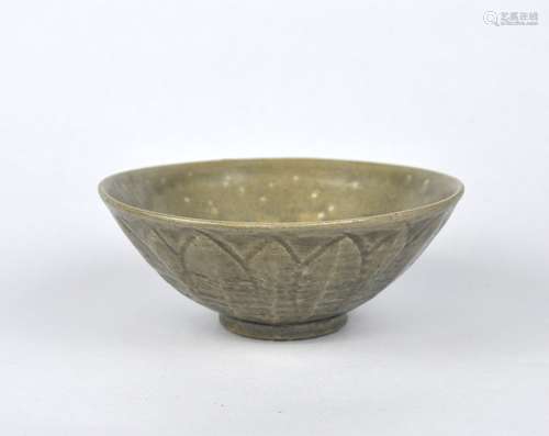 An early Chinese Yue celadon bowl decorated with flower peta...