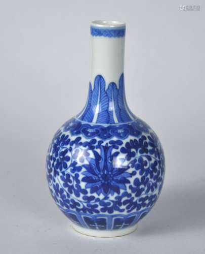A small Chinese Blue & White bottle vase,